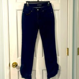 Kate and Mallory blue denim jeans with cute angled ruffles along bottoms.